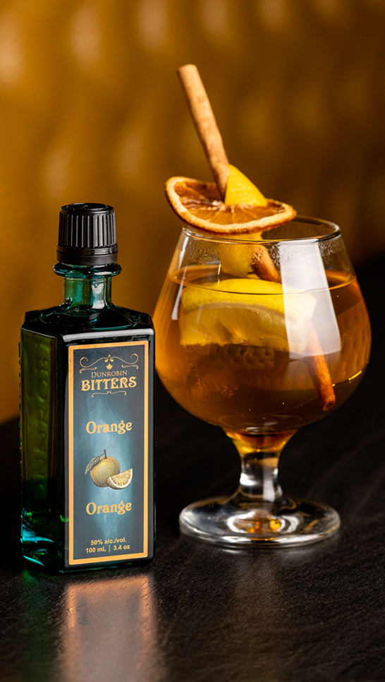 Dunrobin Bitters bottle with cocktail